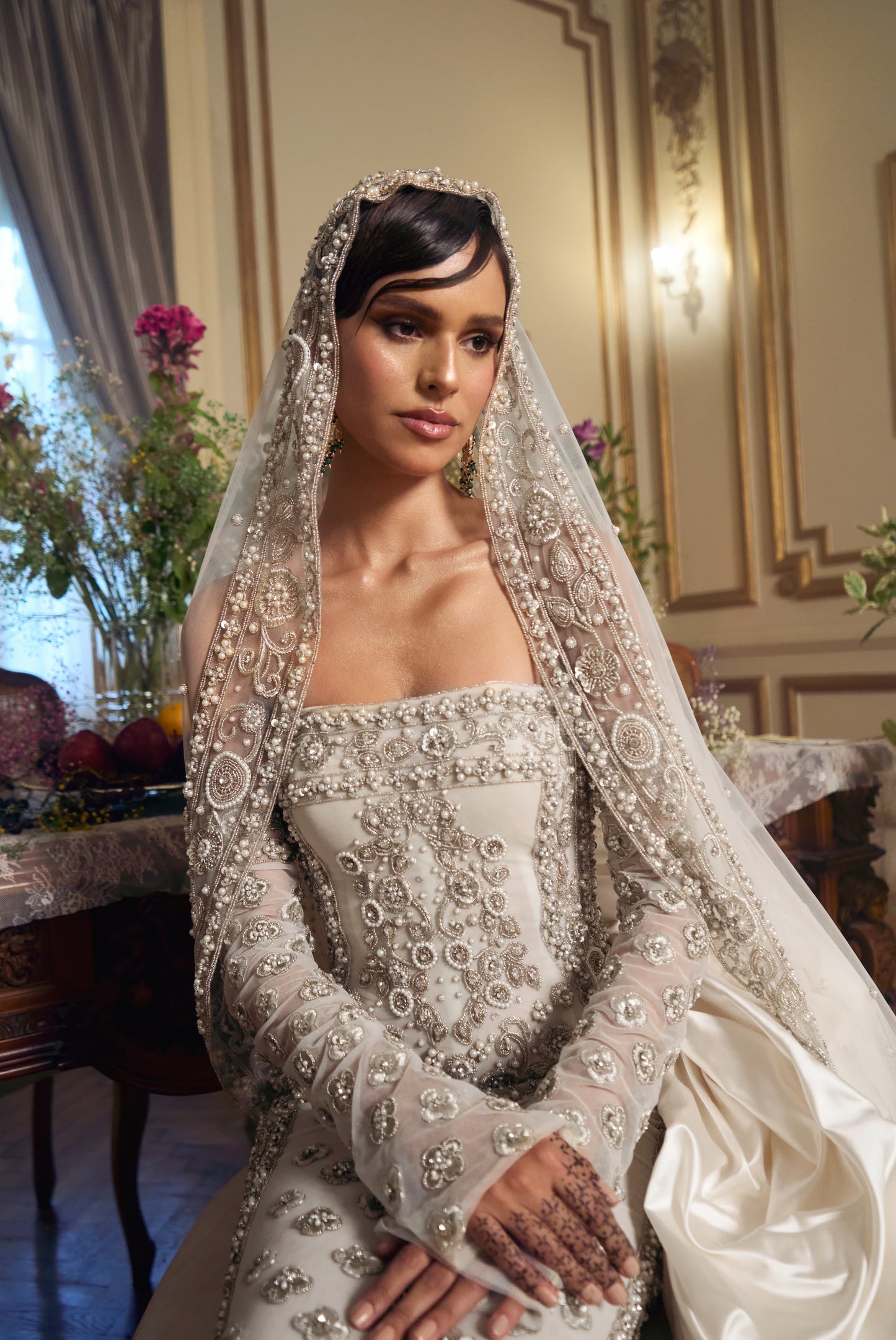 Statuesque fully embroidered wedding gown
