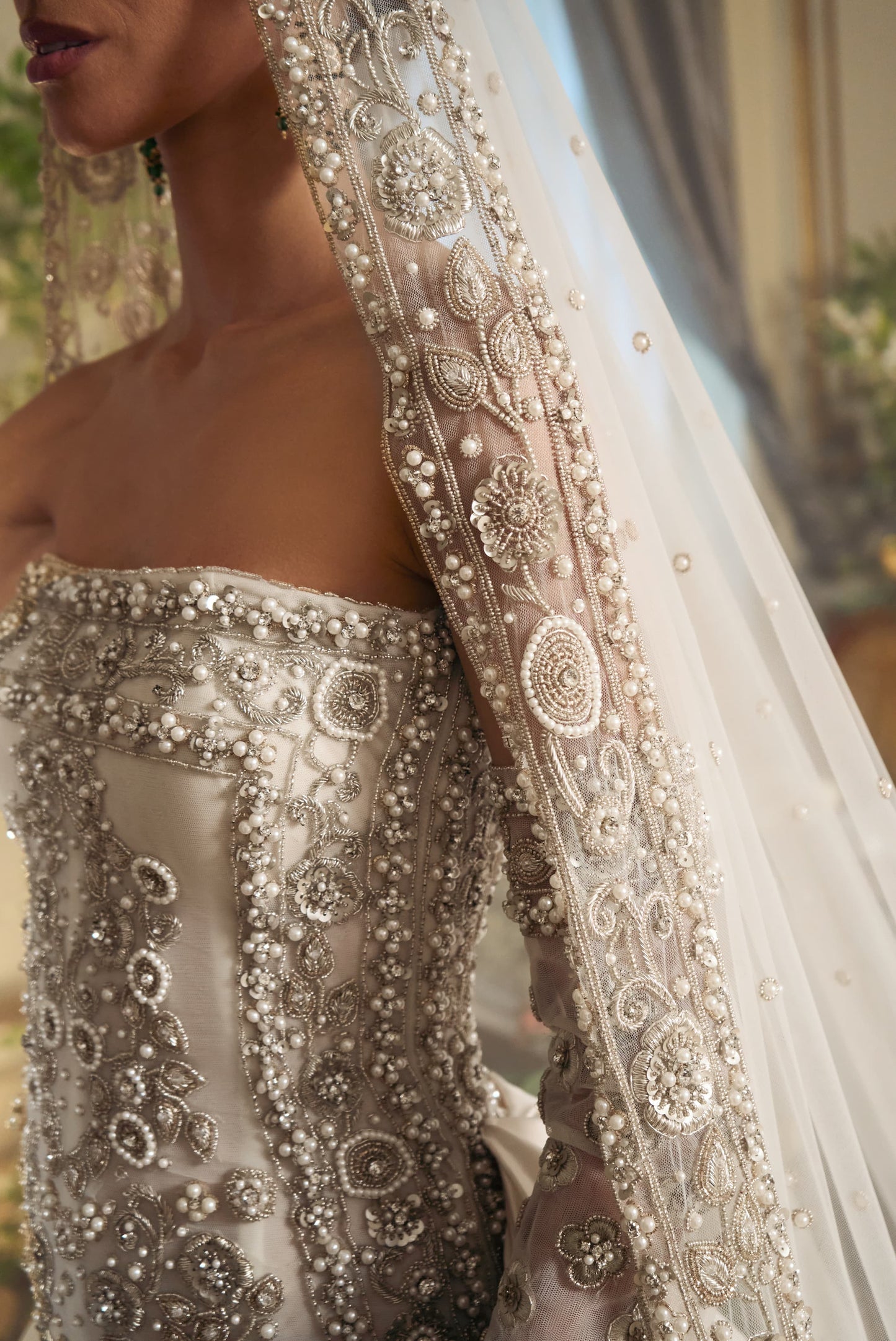 Statuesque fully embroidered wedding gown