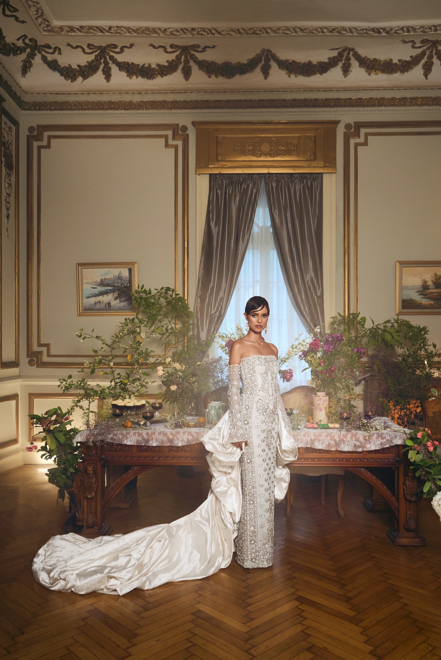 Statuesque fully embroidered wedding gown