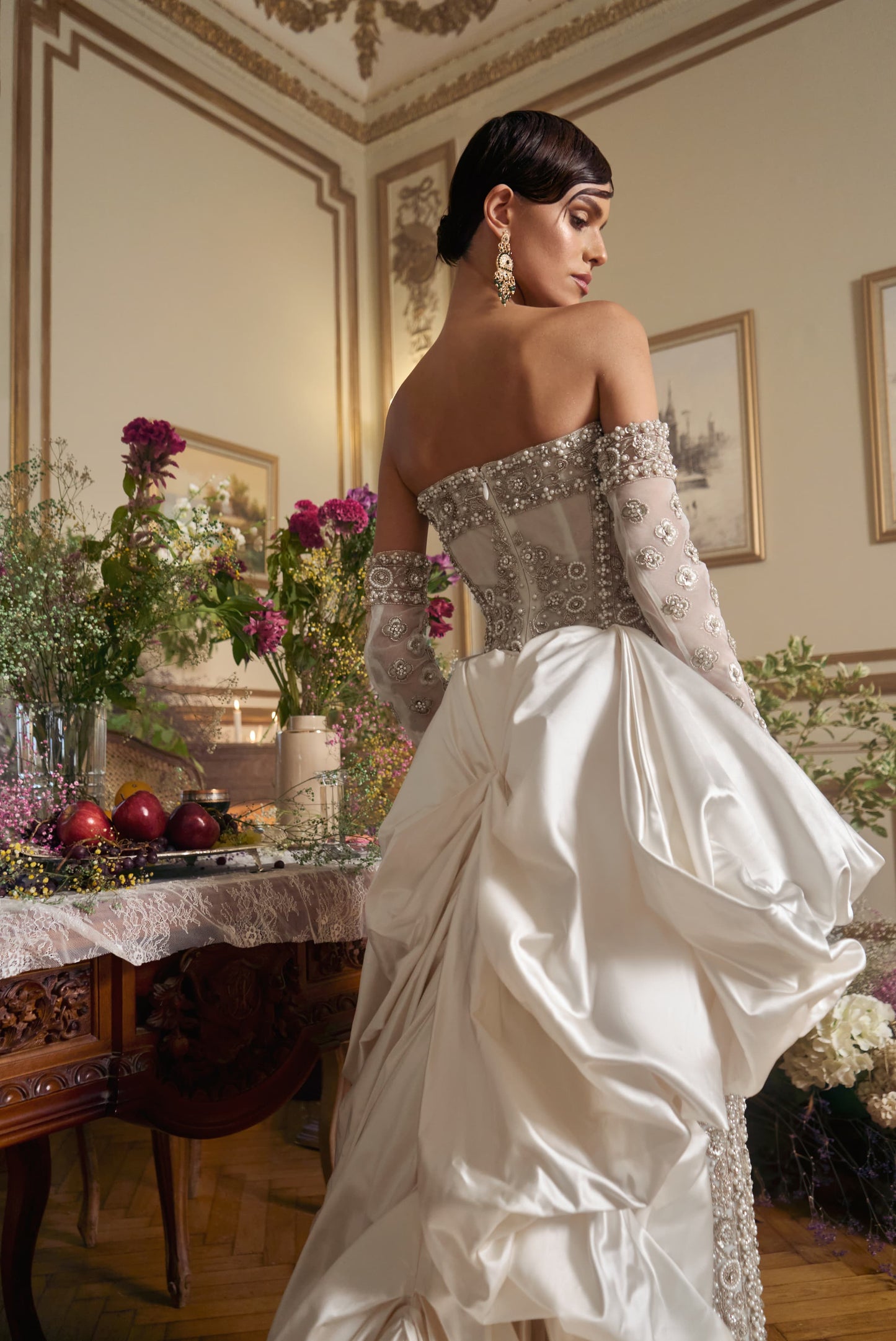 Statuesque fully embroidered wedding gown