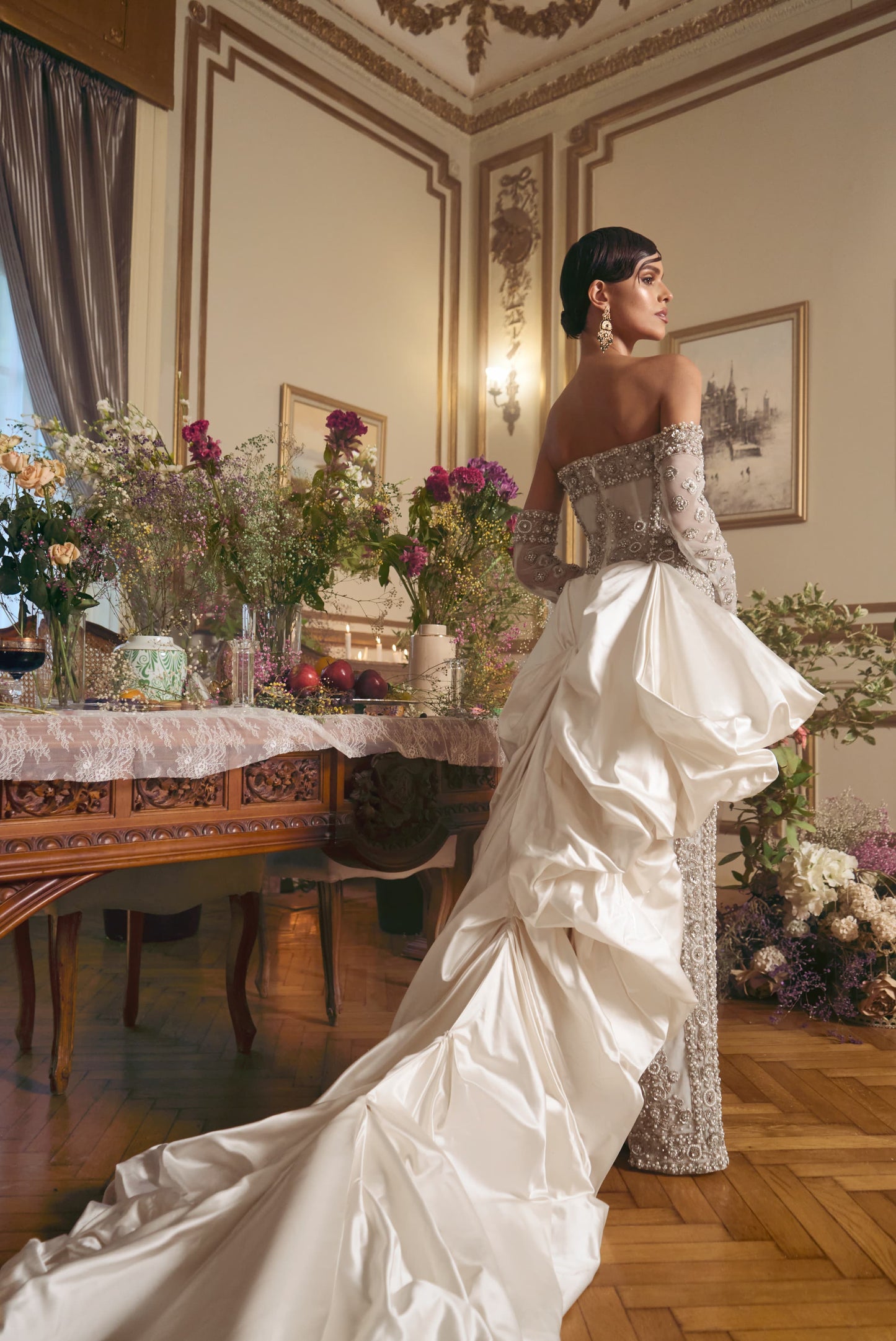 Statuesque fully embroidered wedding gown